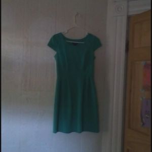 This turquoise dress is a women's size 6,Enjoy!